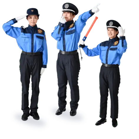 警備員がビルの前に整列している様子